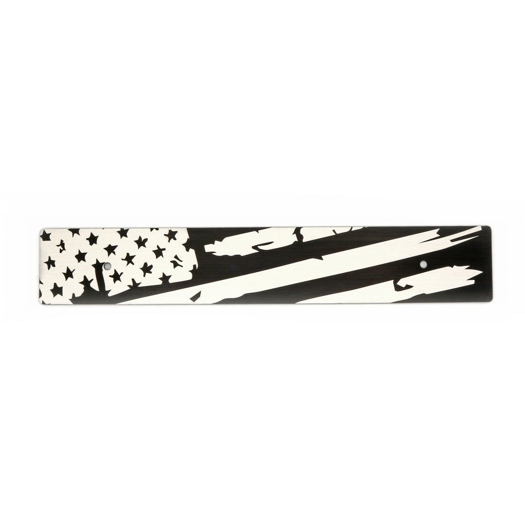 A black and white distressed American flag design on a license plate delete.