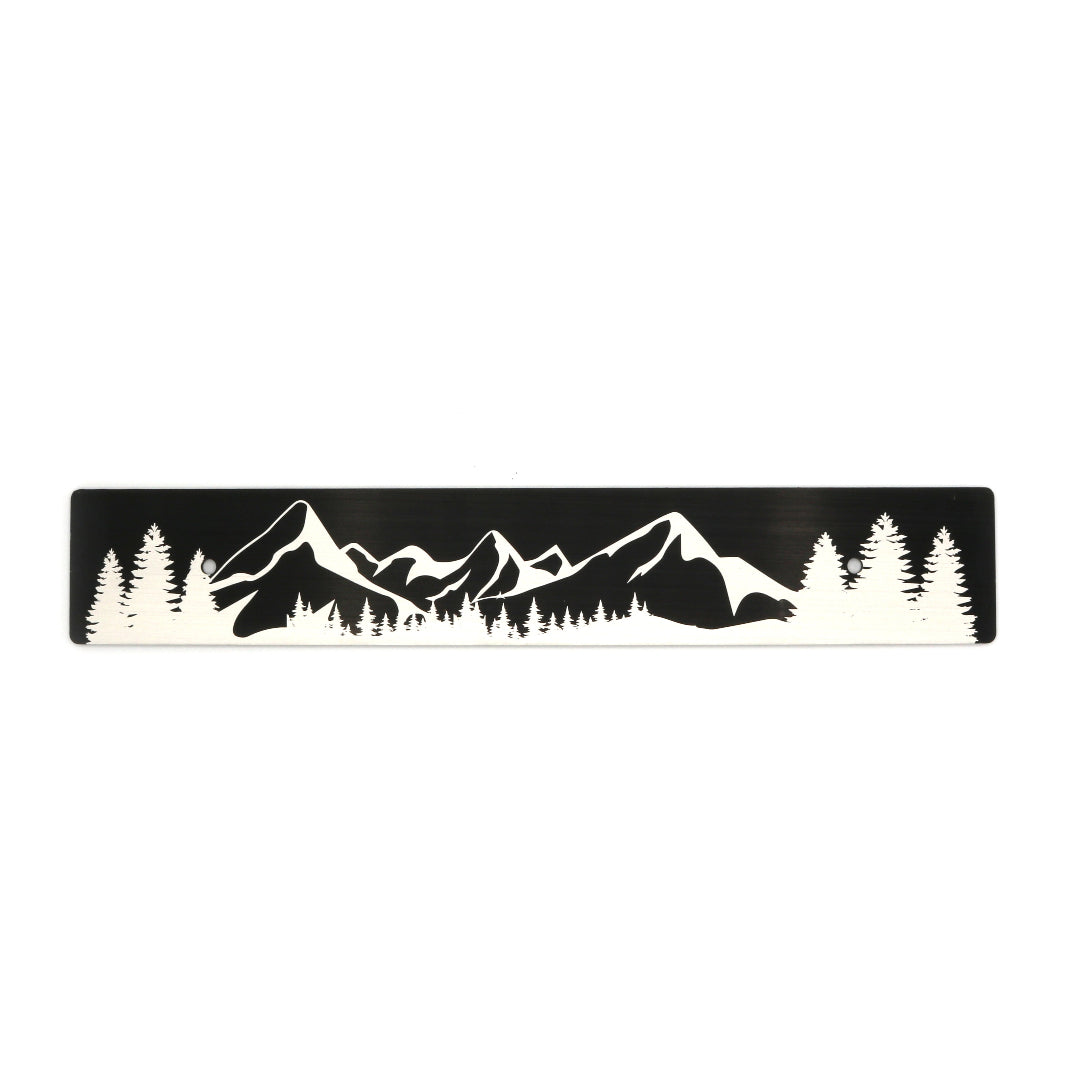 A black anodized aluminum license plate delete with a mountain range silhouette in white.