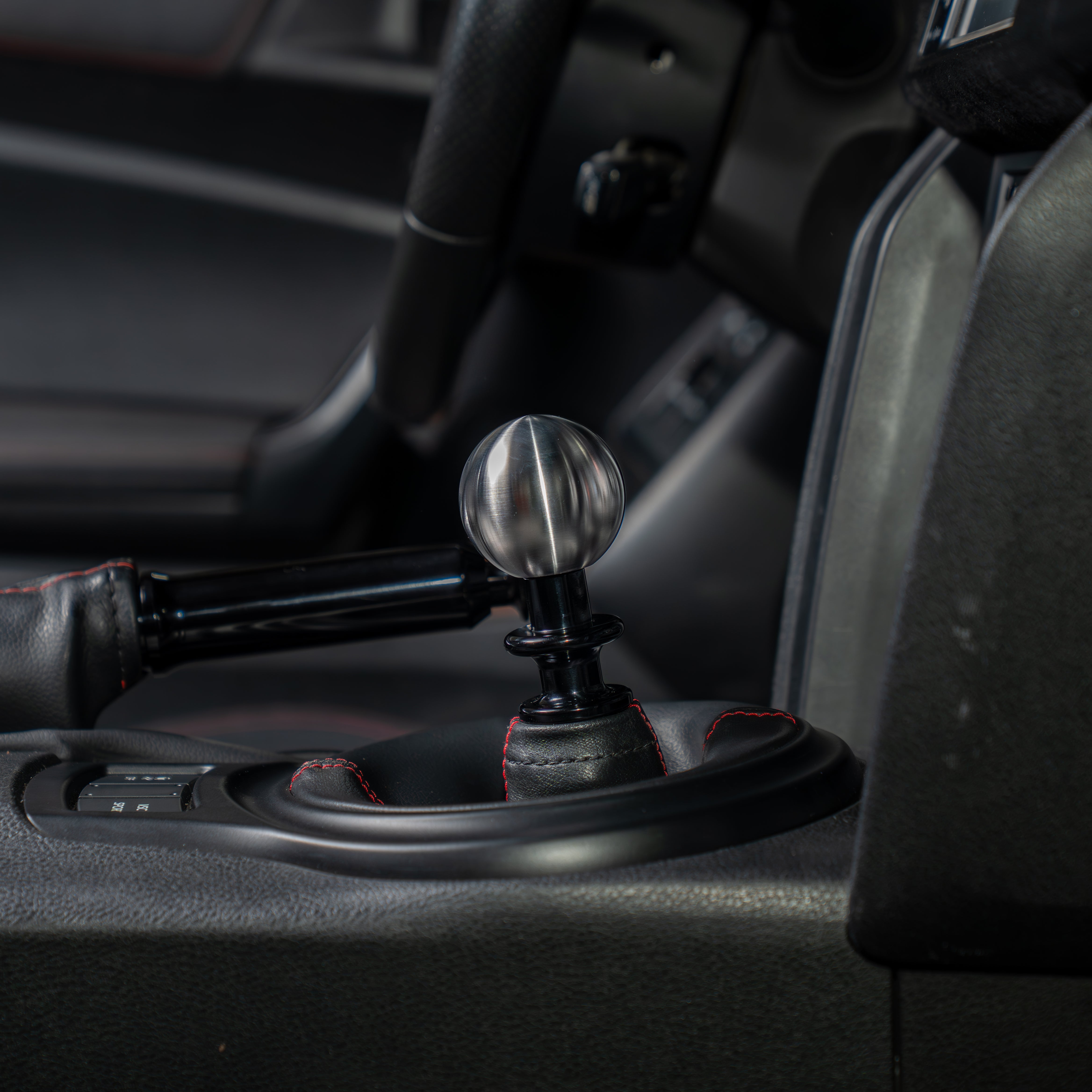 Brushed_Titanium_Sphere_in_BRZ