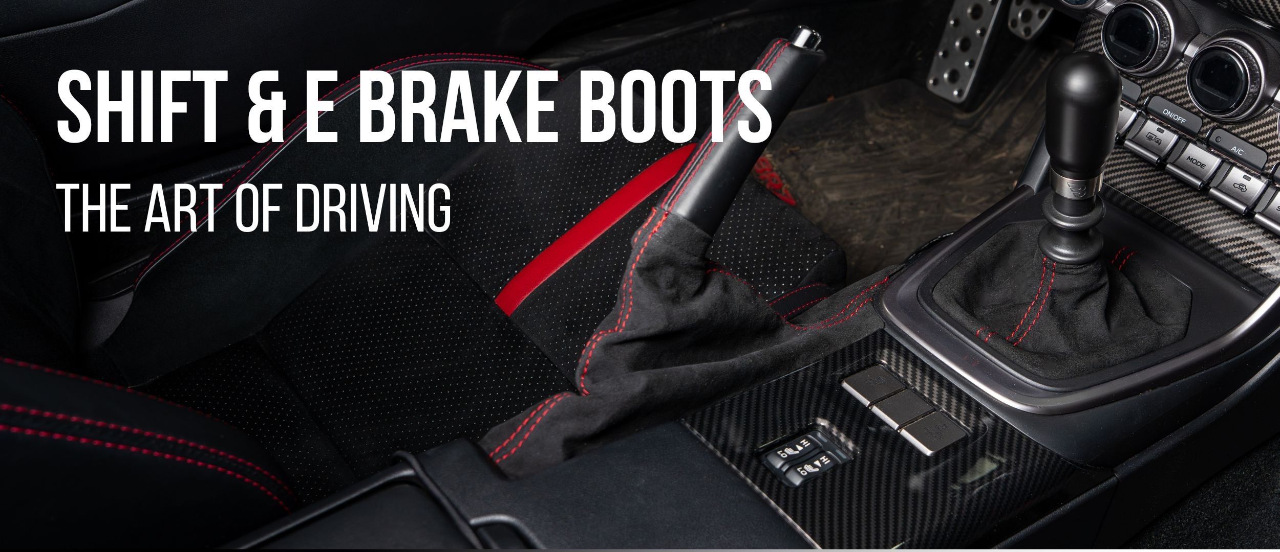 Car interior with shift and e-brake boots, highlighting automotive parts.