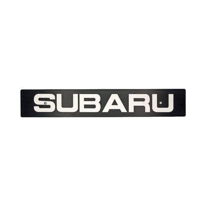 Black and white Subaru logo on a white background