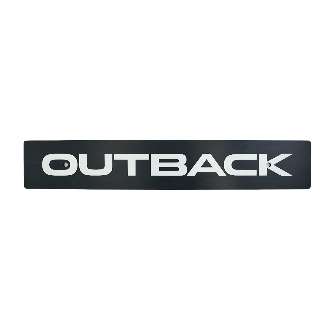Black anodized license plate with the brand 'Outback' milled into the surface.