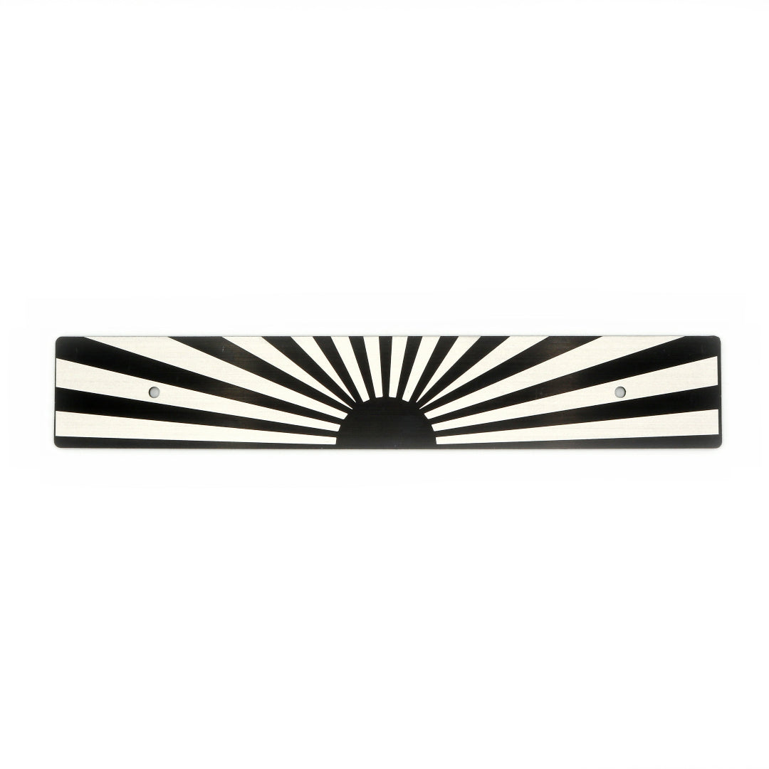 A black and white sunburst pattern license plate delete.