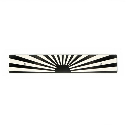 A black and white sunburst pattern license plate delete.