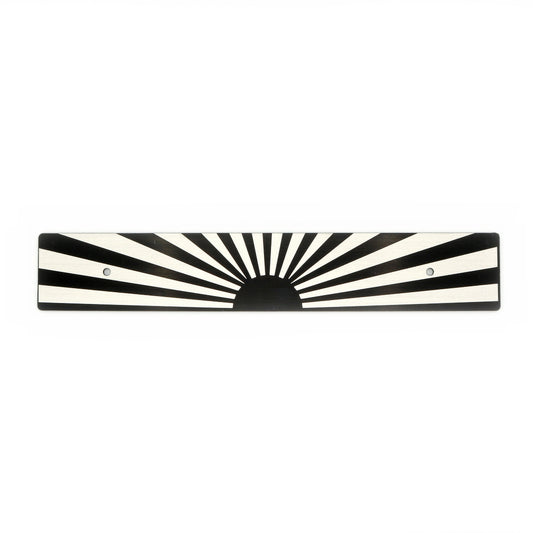 A black and white sunburst pattern license plate delete.