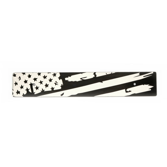 A black and white distressed American flag design on a license plate delete.